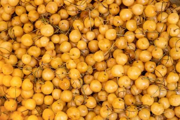 Kuning Cherry Latar Belakang Dengan Menutup Banyak Berry Pasar — Stok Foto
