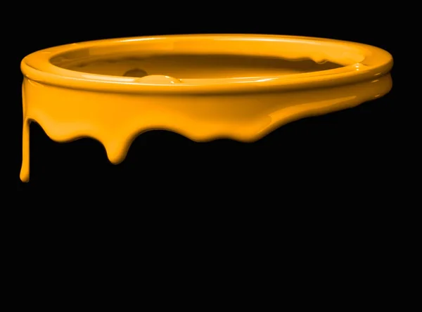 Colorful paint leaking down on wall of metal bucket. Isolated over black background