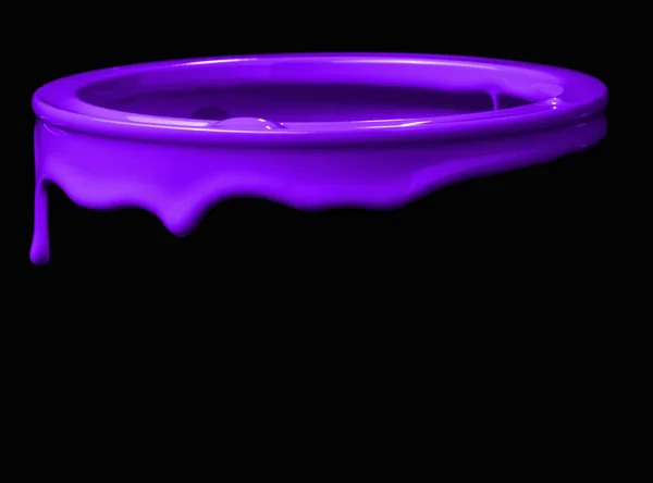 Colorful paint leaking down on wall of metal bucket. Isolated over black background