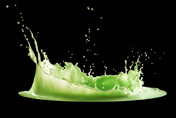 Groene verf splash geïsoleerd op zwarte achtergrond — Stockfoto