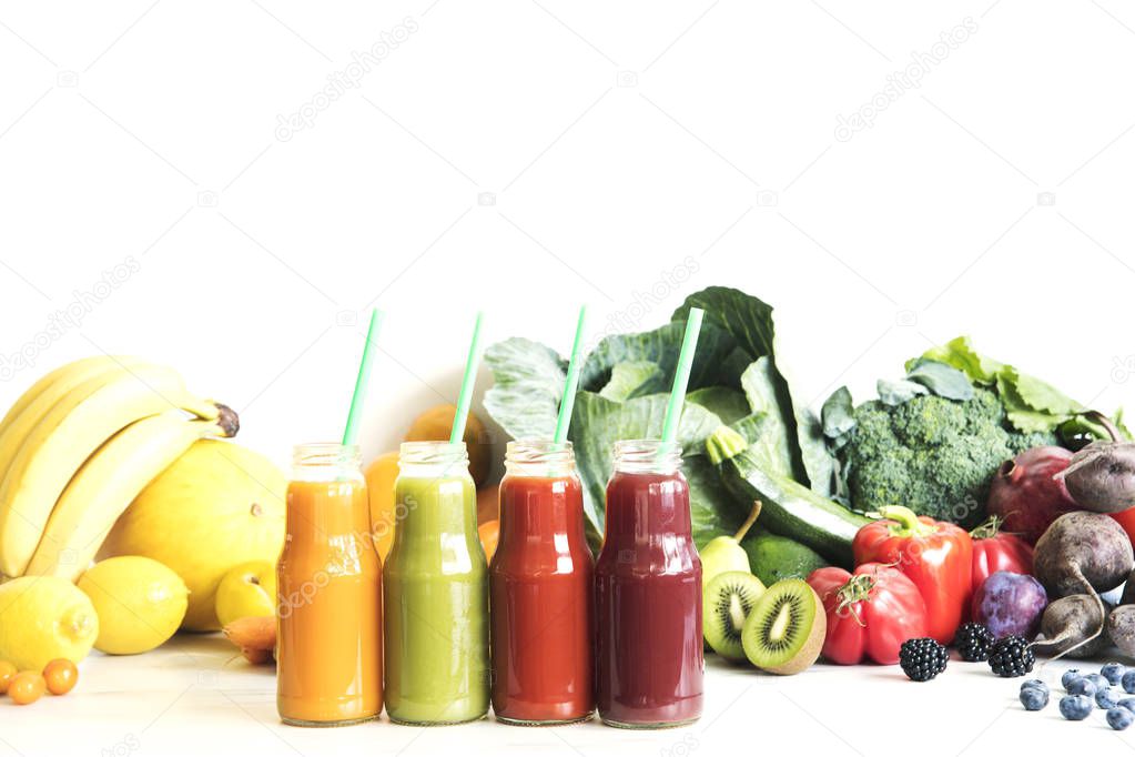 Fresh homemade smoothies with fruits and vegetables on white background