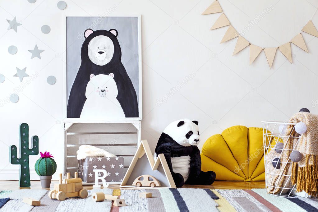 Light children room in scandinavian style with drawing in frame on wall 