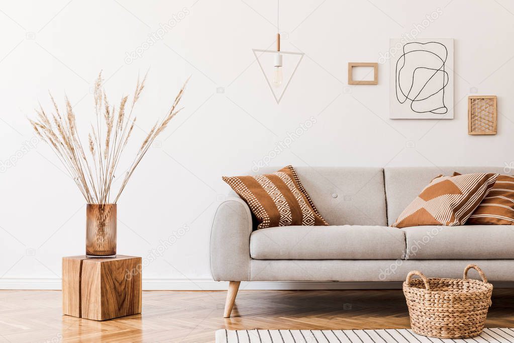 The design boho interior of living room in cozy apartment withh  elegant personal accessories. 