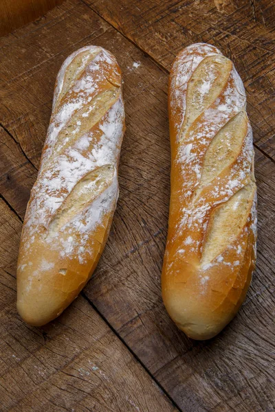 Fresh bread or french baguett and flour — Stock Photo, Image