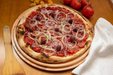 Pizza de Calabresa, Brazilian food. Calabrese sausage pizza with mozzarella cheese, onion, olives and tomato sauce. Traditional pizza in Brazil, it is similar to pepperoni pizza. clipart