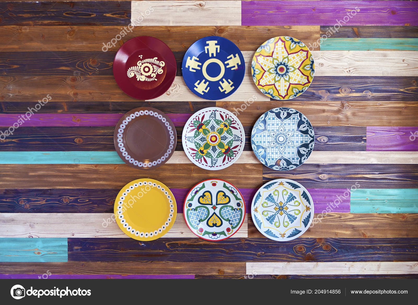 Grunge Painted Wooden Wall Decorative Colorful Plates Stock