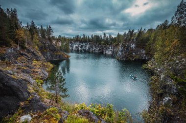 Marble quarry in Ruskeala Mountain Park, Karelia. clipart