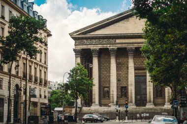 La Madeleine church in Paris, France.View from Rue Royale street clipart