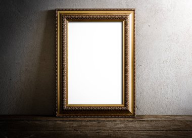 lüks fotoğraf çerçevesinin üzerinde grunge arka plan üzerinde ahşap masa natürmort. Vintage sesi