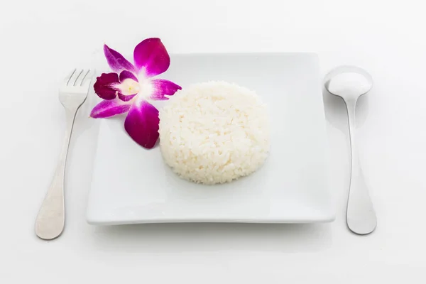 Cooked Rice Spoon Fork White Dish Orchid White Background — Stock Photo, Image