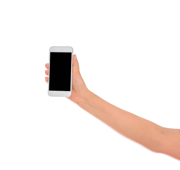 空白の画面を持つ携帯電話のスマート フォンを持つ女性の手 クリッピング パスと白い背景で隔離 — ストック写真
