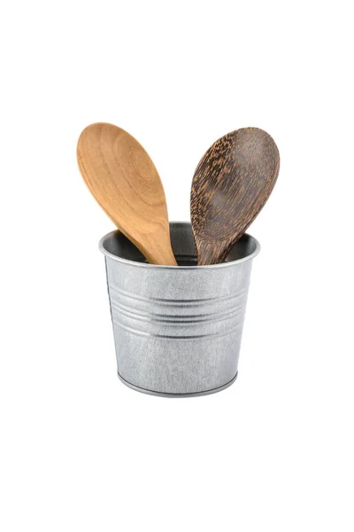 Wooden kitchen set skimmer, spade of frying pan in metal box iso — Stock Photo, Image
