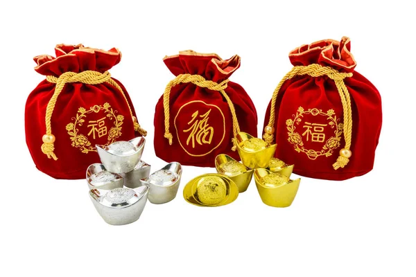Dekoracja chińskich złotych wlewków i czerwonej tkaniny lub jedwabnej torby jest — Zdjęcie stockowe
