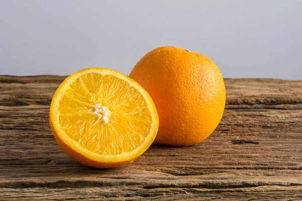 Still Life Half crescent, Full Fresh Orange Fruit on Vintage gru — Stock Photo, Image