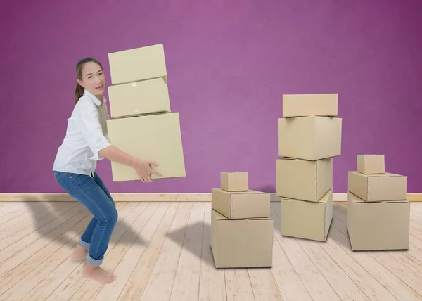 woman carrying and lifting boxes