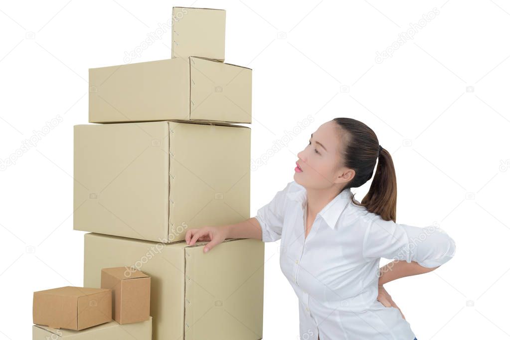 woman suffering from backache while moving boxes isolated on whi