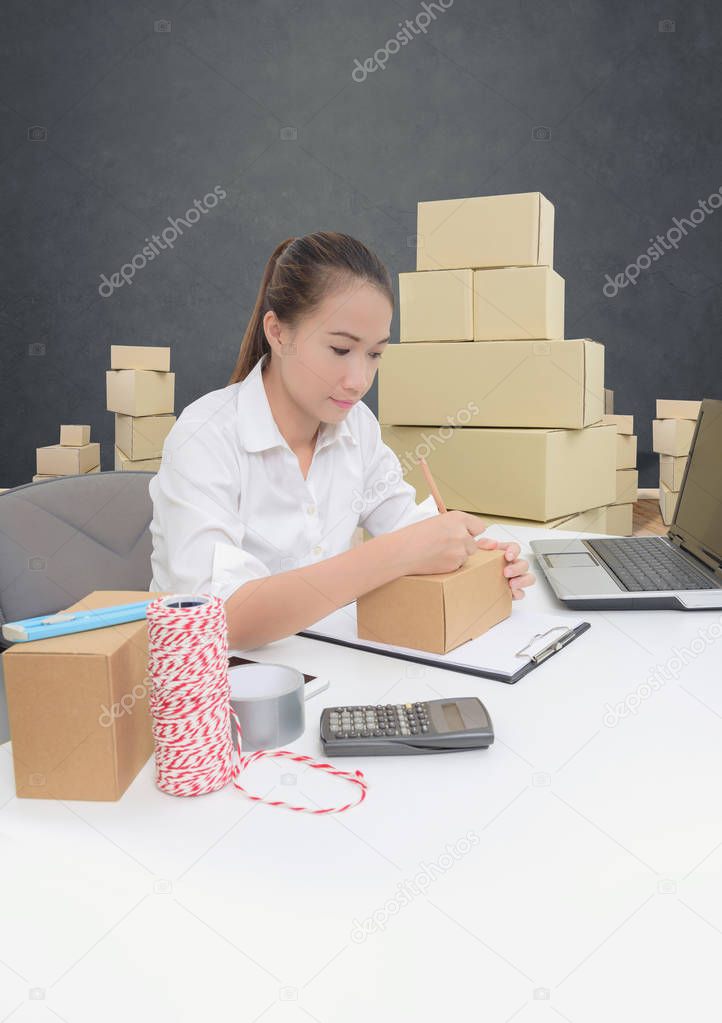 business owner woman working online shopping prepare product pac