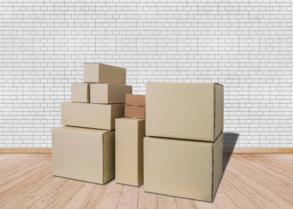 Me mudo a un nuevo hogar. Habitación vacía con cajas de cartón — Foto de Stock