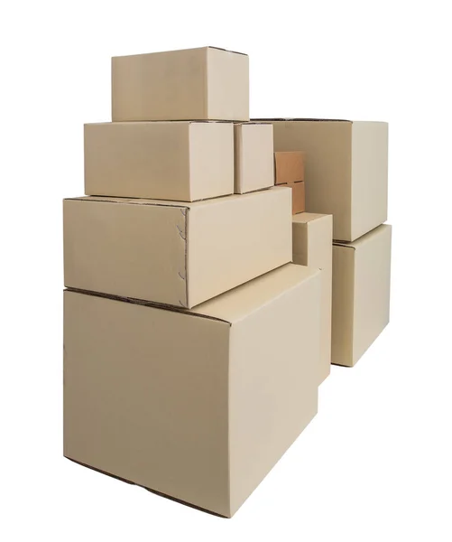 Pudełka tekturowe w różnych rozmiarach ułożone pudełka izolowane na WHI — Zdjęcie stockowe