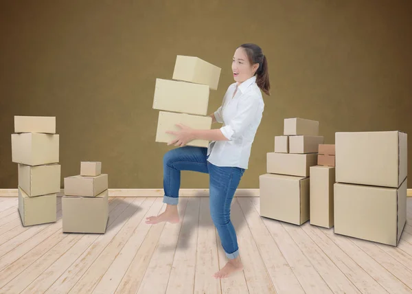 woman carrying and lifting boxes