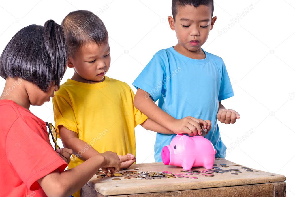 Group of asian children have fun with piggy bank isolated on whi