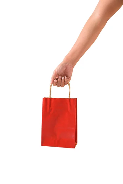 手握红纸购物袋的女性 — 图库照片