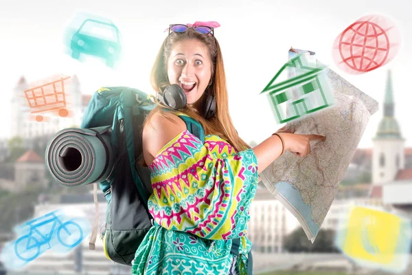 Happy hiker girl with backpack and map, trekking and travel lifestyle concept