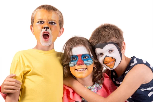 Niños con pintura facial animal —  Fotos de Stock