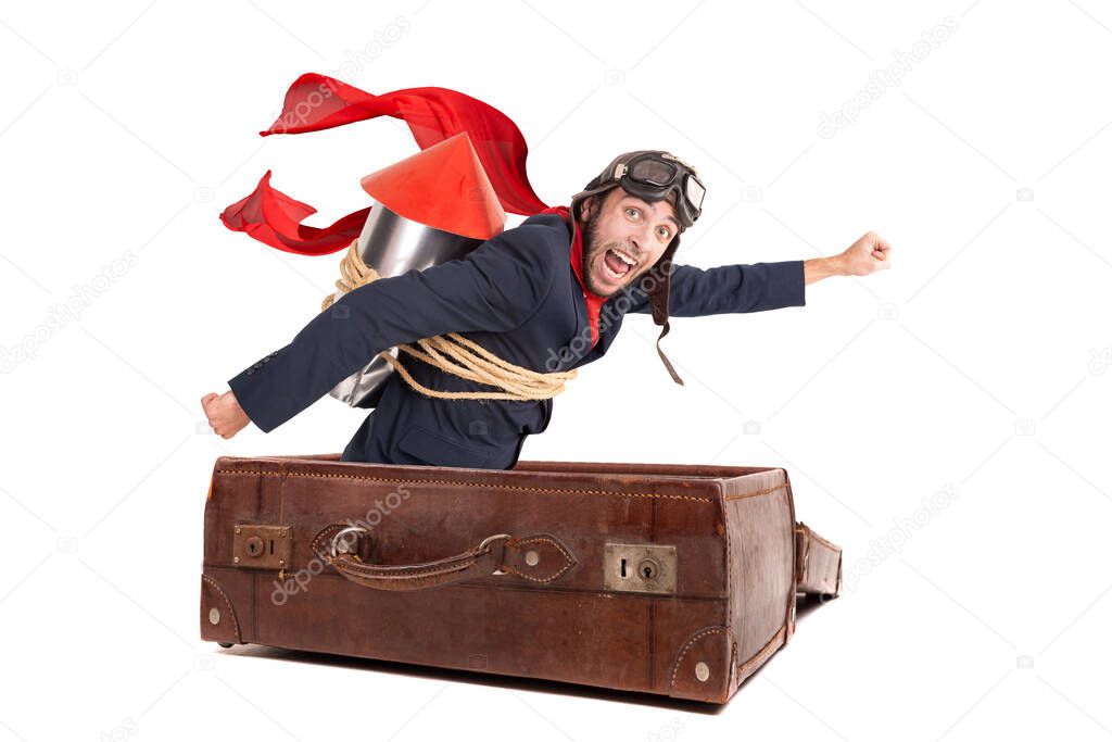 Businessman flying an old suitcase isolated in white