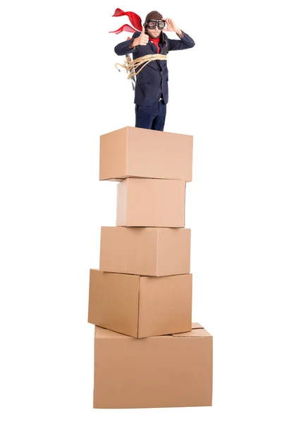Businessman Homemade Rocket Googles Top Stack Cardboard Boxes Ready Take — Stock Photo, Image