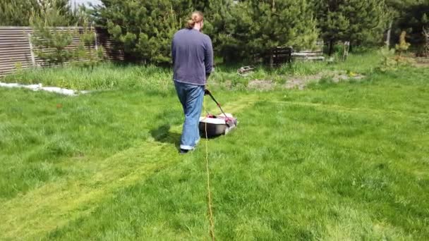 Man Mows Lawn Dacha Lawn Mower Cuts Grass Dacha — Stock Video