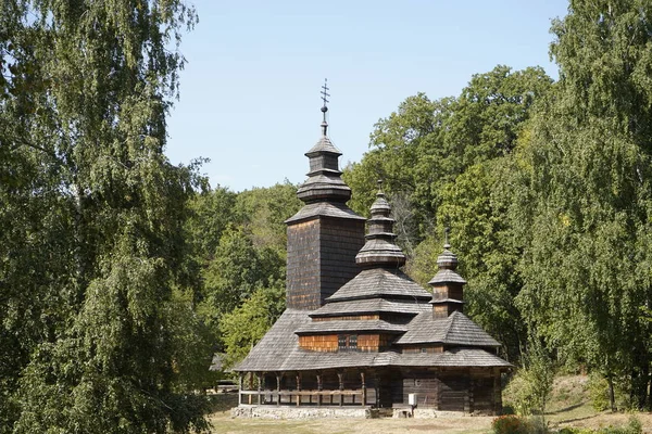 Kiev, Ukraine, Europe - September 2019: Old wooden church among Stock Picture