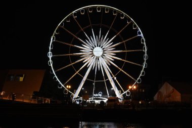 Dönme dolap. Dönme dolap t 'nin arka planında döner