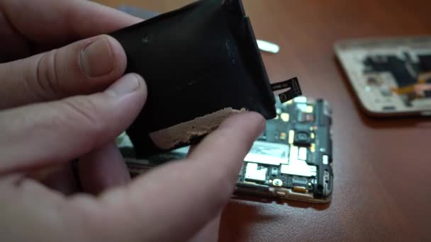 Swollen Smartphone Battery Damaged Smartphone Faulty Battery Damaged Phone Wooden — Stock Video
