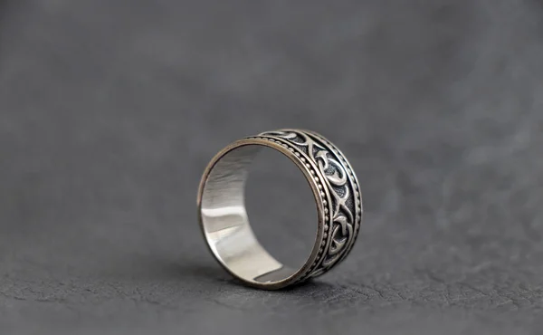 Silver Ring Lies Dark Gray Genuine Leather — Stock Photo, Image