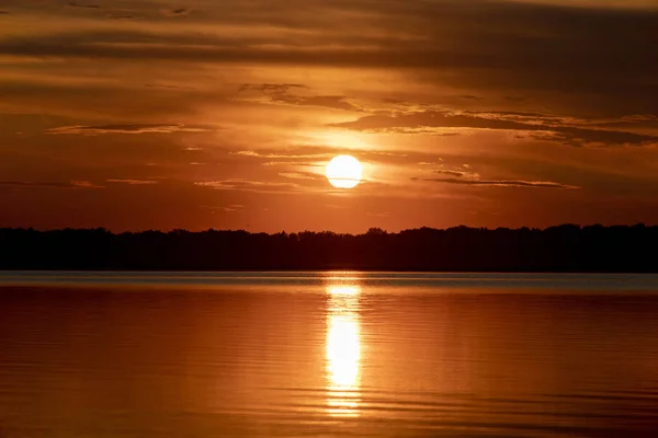 beautiful sunset on the banks of the river Dnieper in Ukraine in the month of July