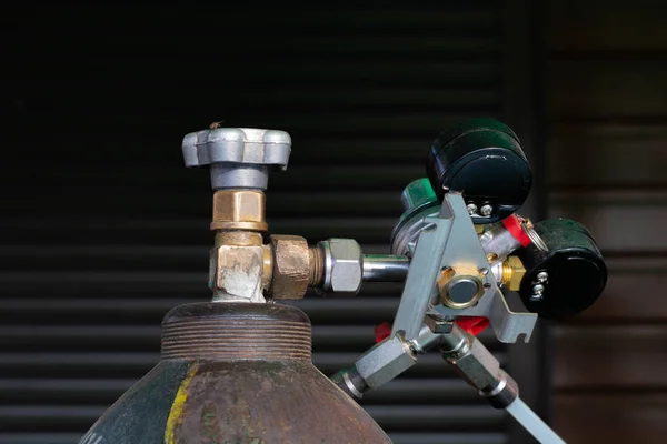 Oxygen cylinder on a dark background