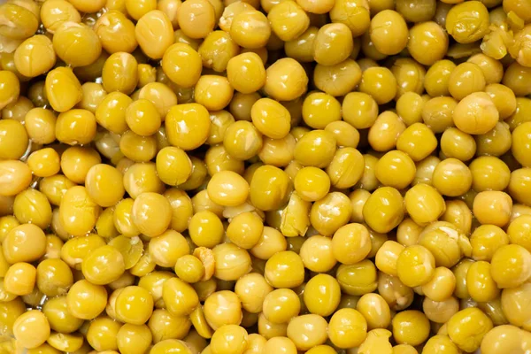 缶詰のエンドウ豆の緑の背景 — ストック写真