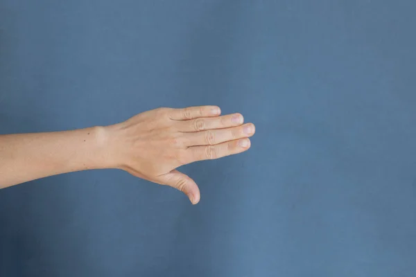 Young Female Hand Gray Background — Stock Fotó