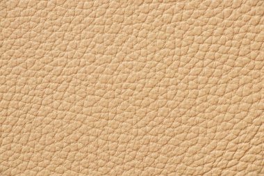 Yakın plan olarak koyu kahverengi hakiki deri.