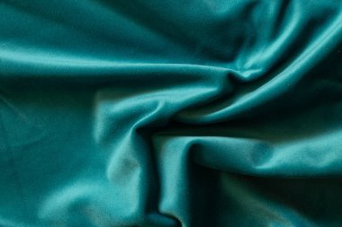 Yakın plan olarak düz koyu mavi buruşuk kumaş