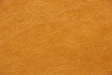 Yakın plan olarak koyu kahverengi hakiki deri.