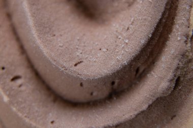 Arkadaki makro olarak çikolatalı dondurma dalgası