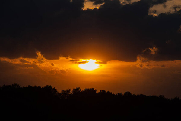 sunset against the background of a large cloud in Ukraine in the city of dnipro