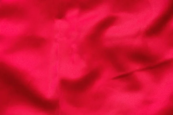 red silk crumpled close-up as background, silk dress