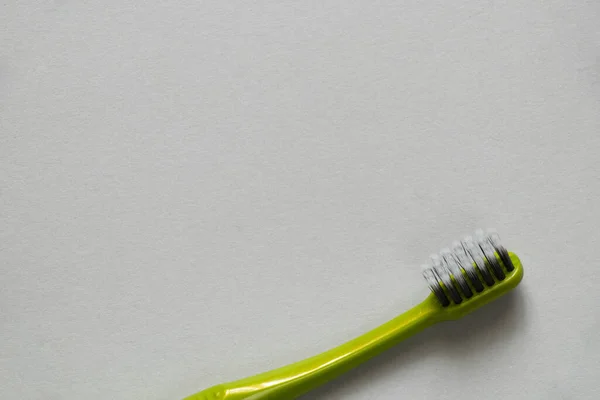 Πράσινη Νέα Οδοντόβουρτσα Απομονωμένο Φόντο Από Κοντά — Φωτογραφία Αρχείου