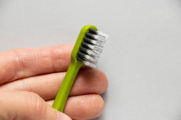 Green New Toothbrush Girl Hand Isolated Background Close — Stock Photo, Image