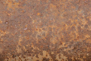 Eski metal yüzey tamamen kahverengi-turuncu pas ile kaplı kabataslak doku ve benekler arka plan veya duvar kağıdı olarak