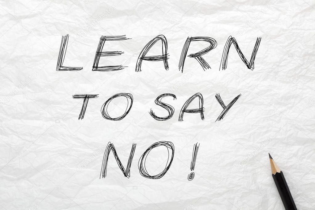 Learning to Say No written with pencil on wrinkled lined paper.