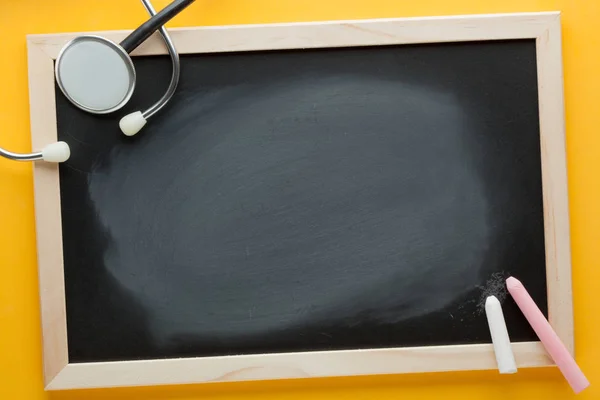 Stethoscope Blackboard Empty Space Text Yellow Background Medical Concept — Stock Photo, Image